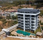 Alanya'da Şehir ve Doğa Manzaralı Şık Tasarımlı Daireler 