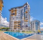 Alanya Merkezde Havuzlu Sitede Şık Tasarımlı Daireler
