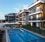 Элегантная 2-комнатная квартира на первом этаже в Белеке Анталья