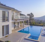 Вилла с видом на горы рядом с пляжем в Фетхие Олюдениз