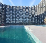 شقق مطلة على البحر ضمن مجمع سكني مع مسبح في مرسين أرديملي