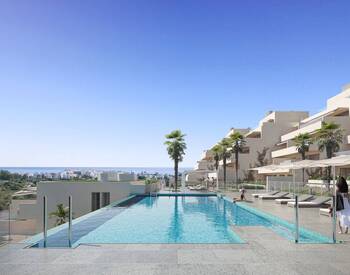 Estepona'da Deniz Manzaralı ve Şık Tasarımlı Modern Daireler 1