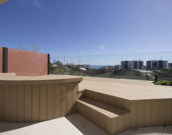 Квартира с видом на море и общим бассейном в Фуэнхироле 3