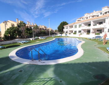 Квартиры с 2 спальнями в 500 м от моря в Кампоамор Гольф 1