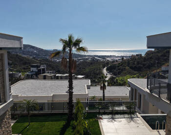 Alanya Kargıcak'ta Deniz ve Dağ Manzaralı Sitede Şık Daireler 1