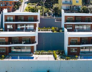 منازل منفصلة مع حمامات سباحة خاصة في ألانيا تركيا 1