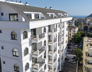 Квартиры в комплексе с бассейном в центре Алании 1