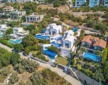 منازل بغرفة نوم واحدة وغرفتي نوم مطلة على البحر في كالكان أنطاليا 2