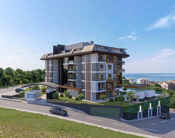Alanya Kestel'de Havuzlu Sitede Şehir ve Deniz Manzaralı Daireler 1