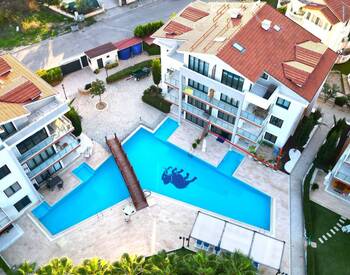 Меблированная квартира 2+1 с садом в комплексе с бассейном в Белеке 1