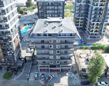 Квартира с выходом к бассейну в Махмутларе, Алания 3