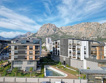 آپارتمان با منظره کوهستان در ویستا پریمیوم با استخر در کنییالتی 1