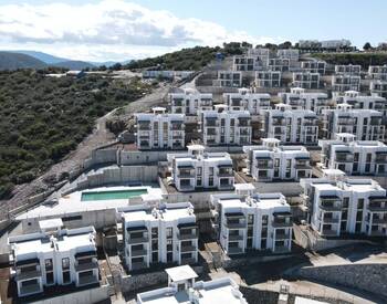 Bodrum Adabükü'nde Havuzlu Site İçinde Manzaralı Daireler 1