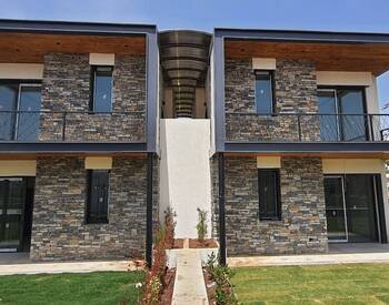 شقق رائعة في مجمع سكني مع شاطئ خاص في بودروم جومشلوك 2