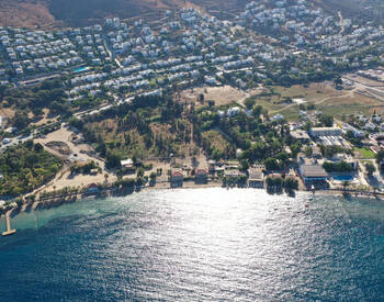 شقق رائعة في مجمع سكني مع شاطئ خاص في بودروم جومشلوك 3