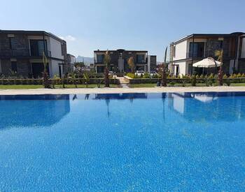 Luxury Real Estate with Private Beach in Gumusluk Bodrum 1