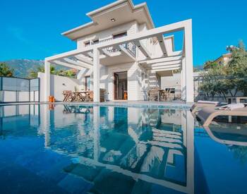 Виллы с частными бассейнами в 10 минутах от пляжа в Фетхие 2
