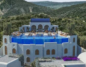 Дома с частными бассейнами и видом на море в Гирне на Северном Кипре 1