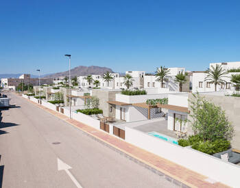 New Semi-detached Homes with Solarium in Puerto De Mazarrón 1