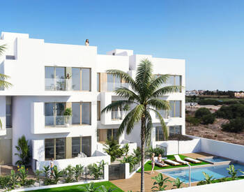 شقق في مجمع سكني يضم مسبحًا في لوس الكازاريس 2