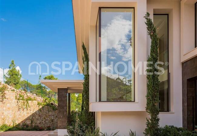 Дизайнерская недвижимость с потрясающими видами в Бенаависе 13