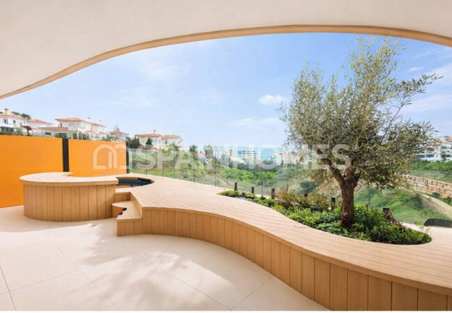 Квартира с видом на море и общим бассейном в Фуэнхироле 1