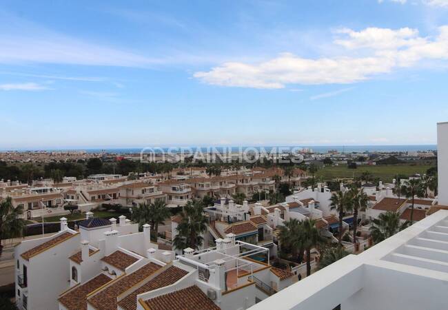 Люкс-квартира с общим бассейном и видом на море в Ориуэле 2