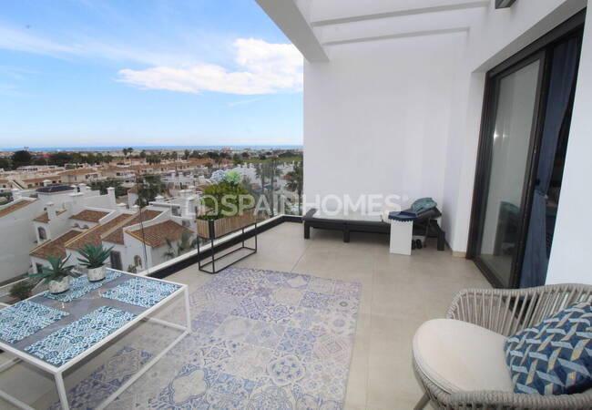 Люкс-квартира с общим бассейном и видом на море в Ориуэле 7