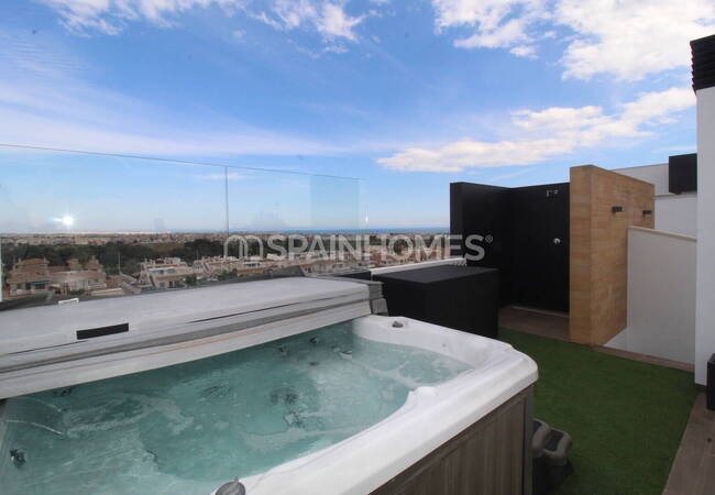 Люкс-квартира с общим бассейном и видом на море в Ориуэле 11