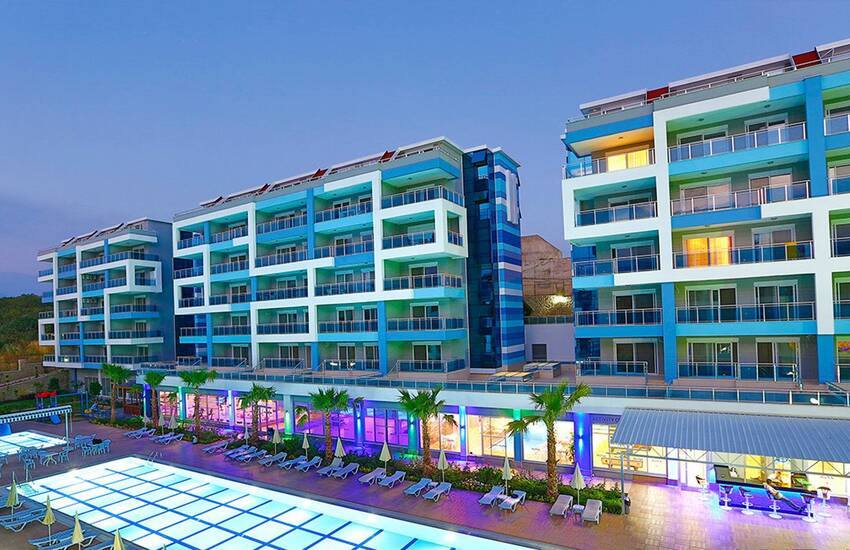 Alanya'da Otel İmkanları Sunan Sitede Sahile 300 Mt Uzaklıkta Daireler 1