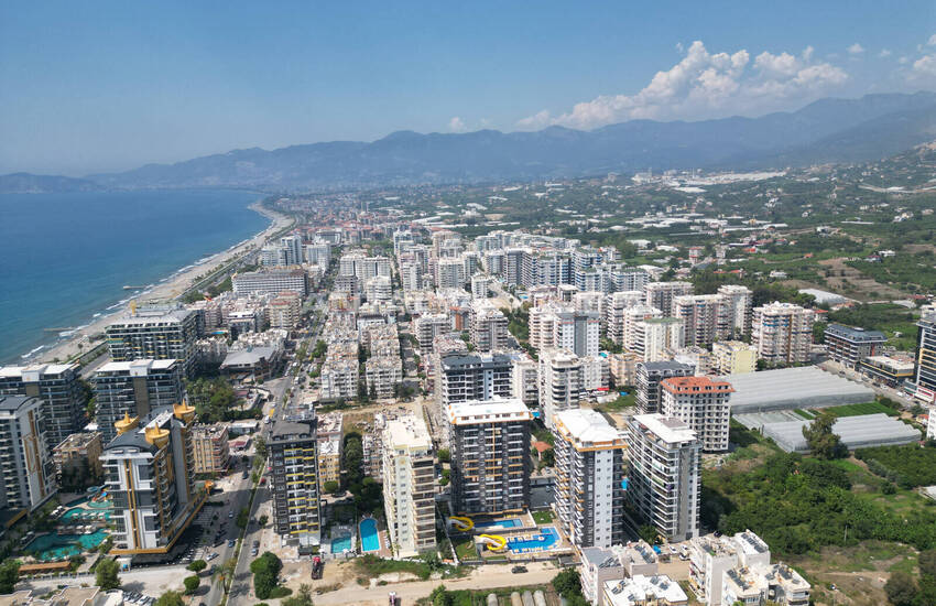 Квартиры в 300 м от моря в центре Махмутлара в Алании 1