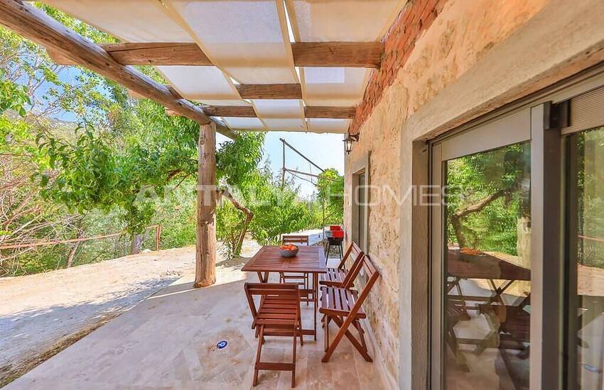 Stone House Intertwined with Nature in Kalkan Islamlar 11