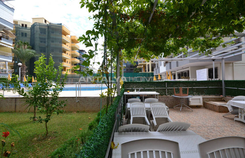 Alanya Mahmutlar'da Denize Sıfır Havuz Manzaralı Eşyalı Daire 14