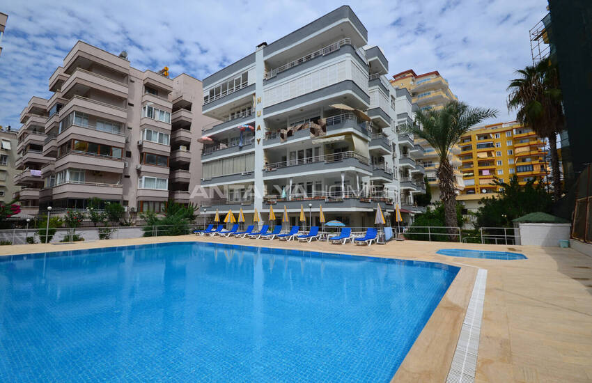 Alanya Mahmutlar'da Denize Sıfır Havuz Manzaralı Eşyalı Daire 1