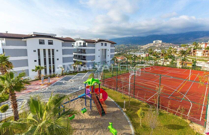 عقارات مطلة على البحر بالقرب من المرافق في ألانيا 13