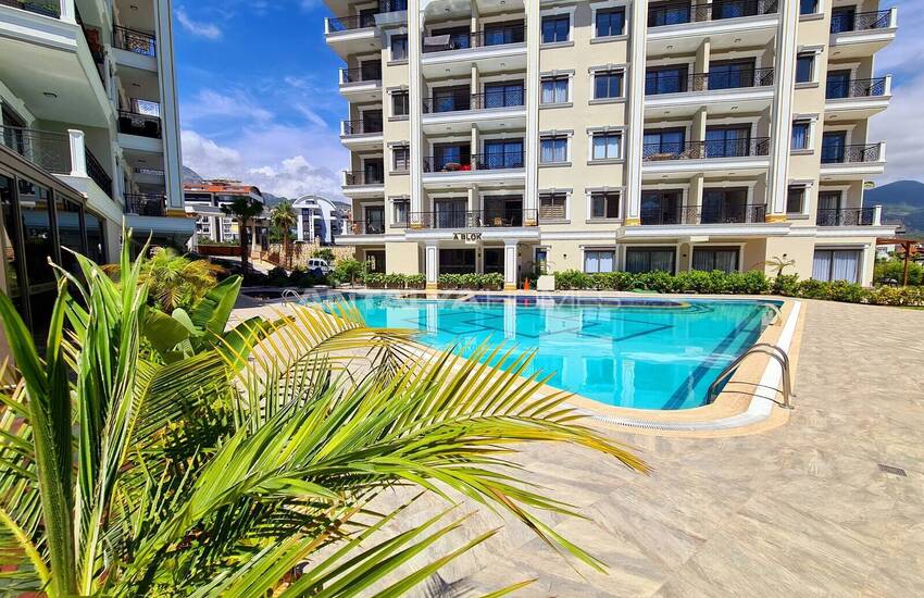 Alanya'da Zengin Olanaklı Sitede Şehir ve Dağ Manzaralı Daireler 10