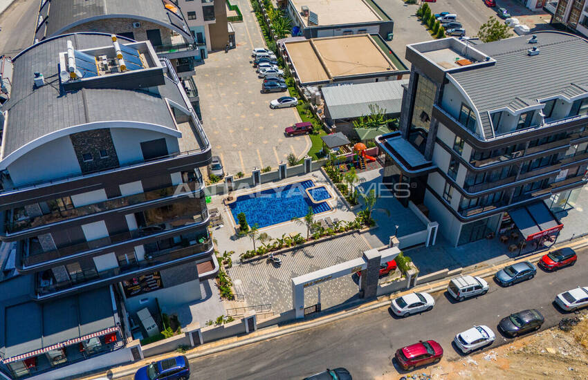 Стильные готовые квартиры в комплексе с бассейном в Алании 7