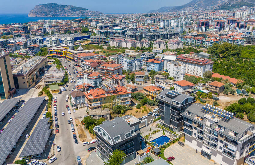 Стильные готовые квартиры в комплексе с бассейном в Алании 13