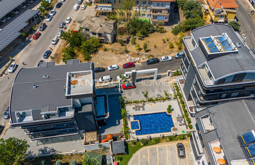 Стильные готовые квартиры в комплексе с бассейном в Алании 14