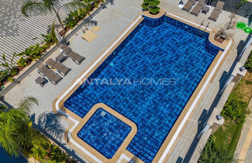 Стильные готовые квартиры в комплексе с бассейном в Алании 15