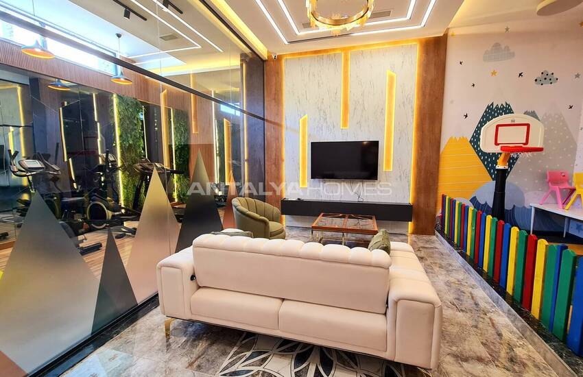 Стильные готовые квартиры в комплексе с бассейном в Алании 32