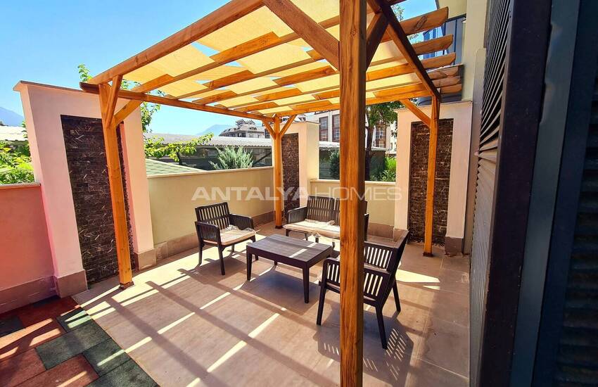 Стильные готовые квартиры в комплексе с бассейном в Алании 22