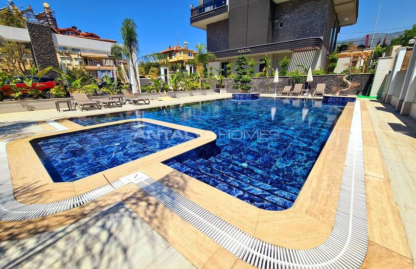 Стильные готовые квартиры в комплексе с бассейном в Алании