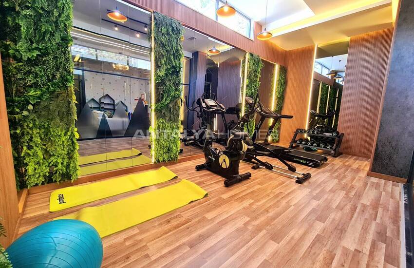 Стильные готовые квартиры в комплексе с бассейном в Алании 30