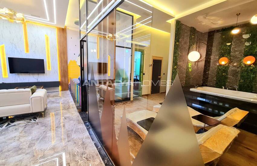 Стильные готовые квартиры в комплексе с бассейном в Алании 28