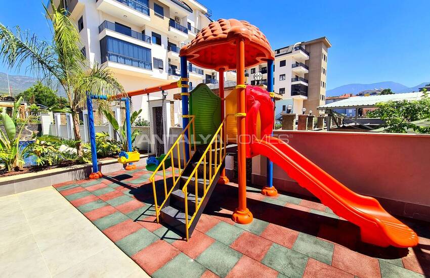 Стильные готовые квартиры в комплексе с бассейном в Алании 23