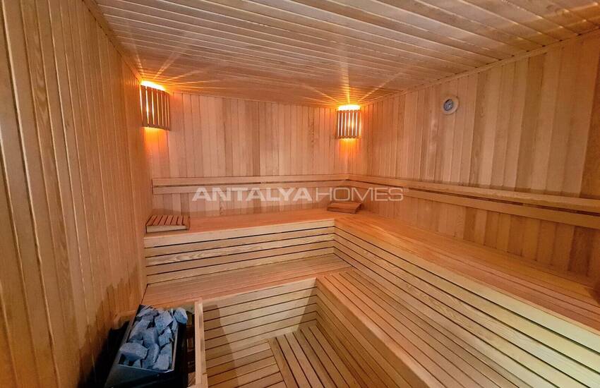 Стильные готовые квартиры в комплексе с бассейном в Алании 33