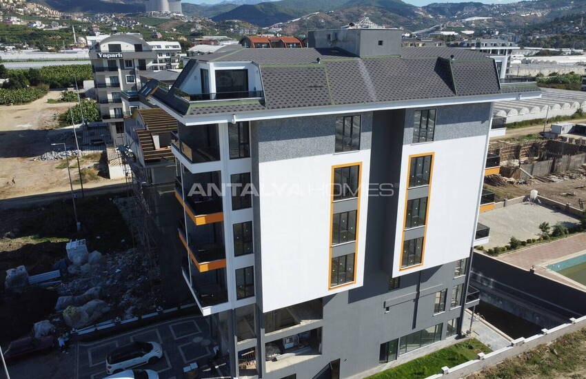 Alanya Kargıcak'ta Deniz ve Dağ Manzaralı Şık Tasarımlı Daireler 1