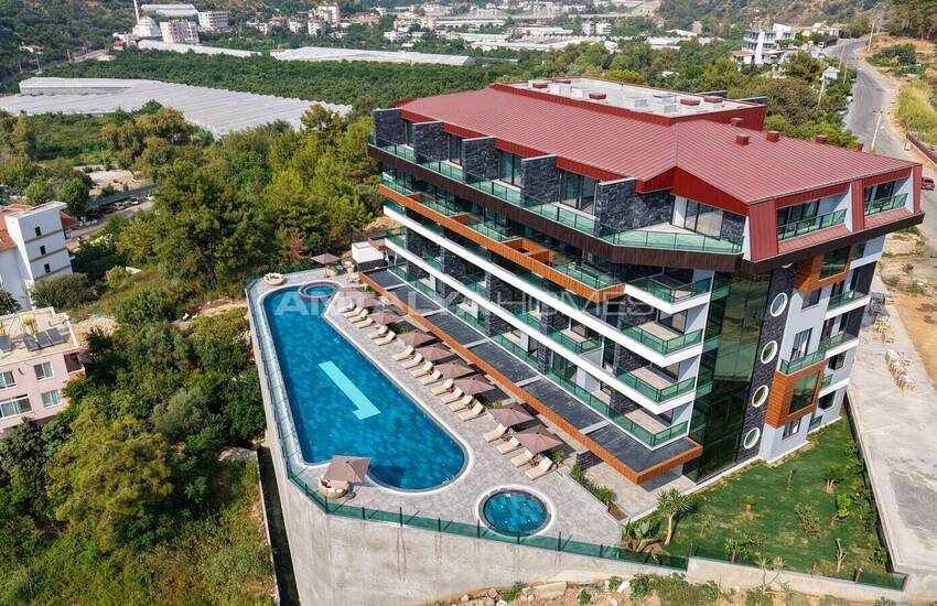 شقق مطلة على البحر والمدينة في مجمع مع مسبح في ألانيا