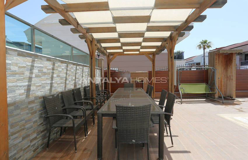 Частично меблированная двухуровневая недвижимость в Коньяалты 12